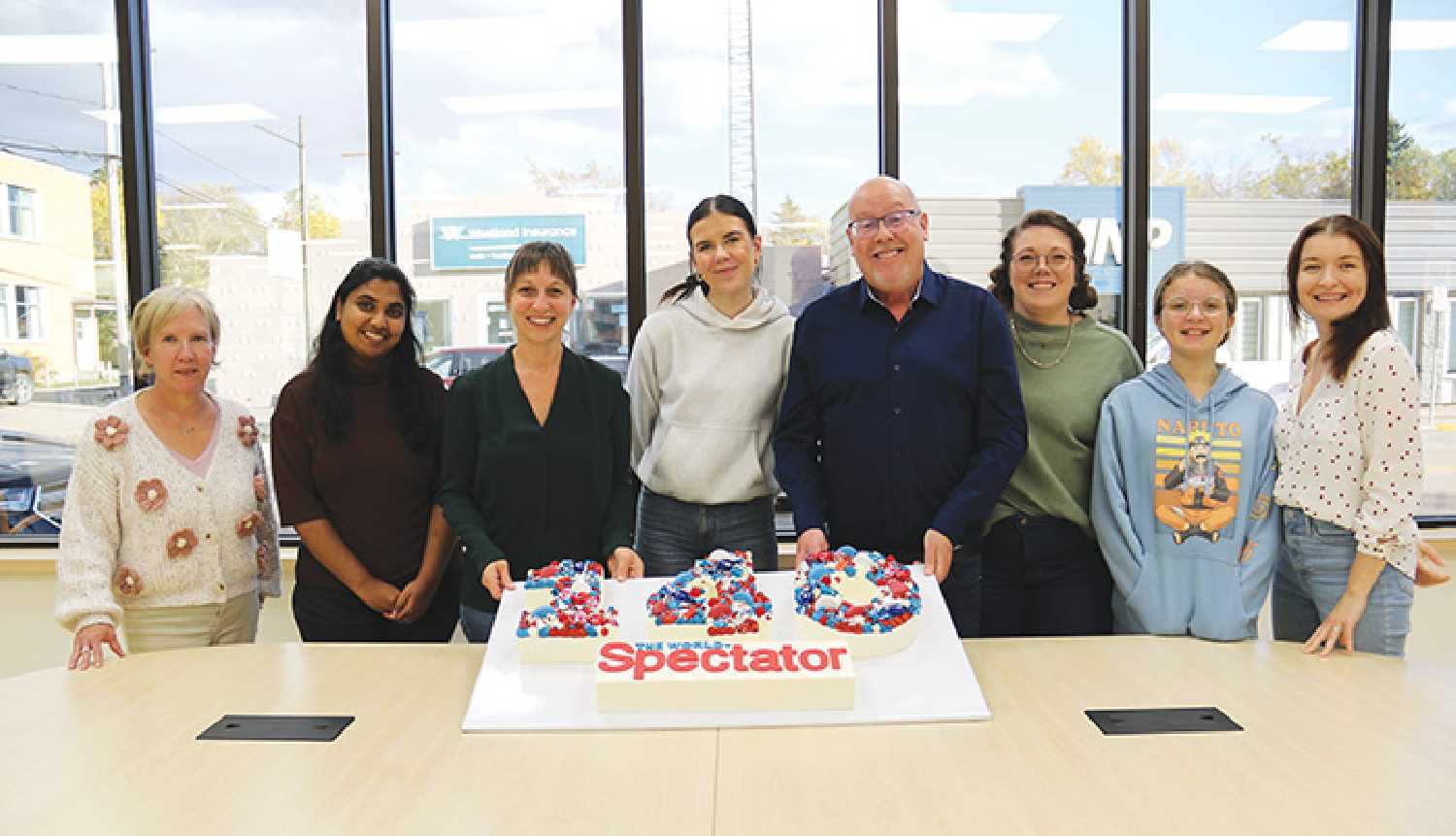 Some of the World-Spectator staff with the newspaper’s 140th anniversary cake on October 2, 2024—140 years to the day from when the first issue was published, on October 2, 1884. The World-Spectator was around for 21 years before Saskatchewan became a province in 1905.